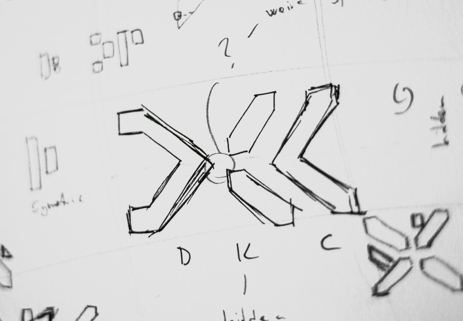 Pencil sketches exploring the DKC monogram