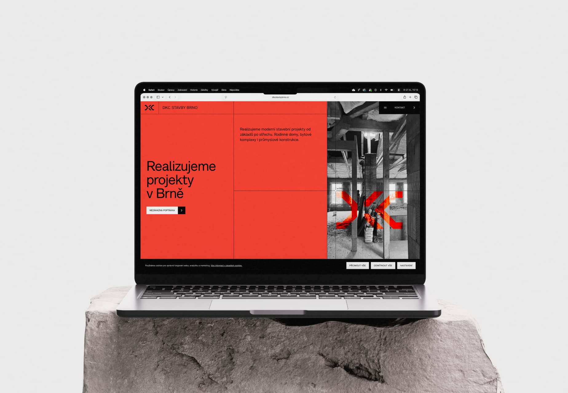 DKC Stavby Brno homepage shown on a laptop