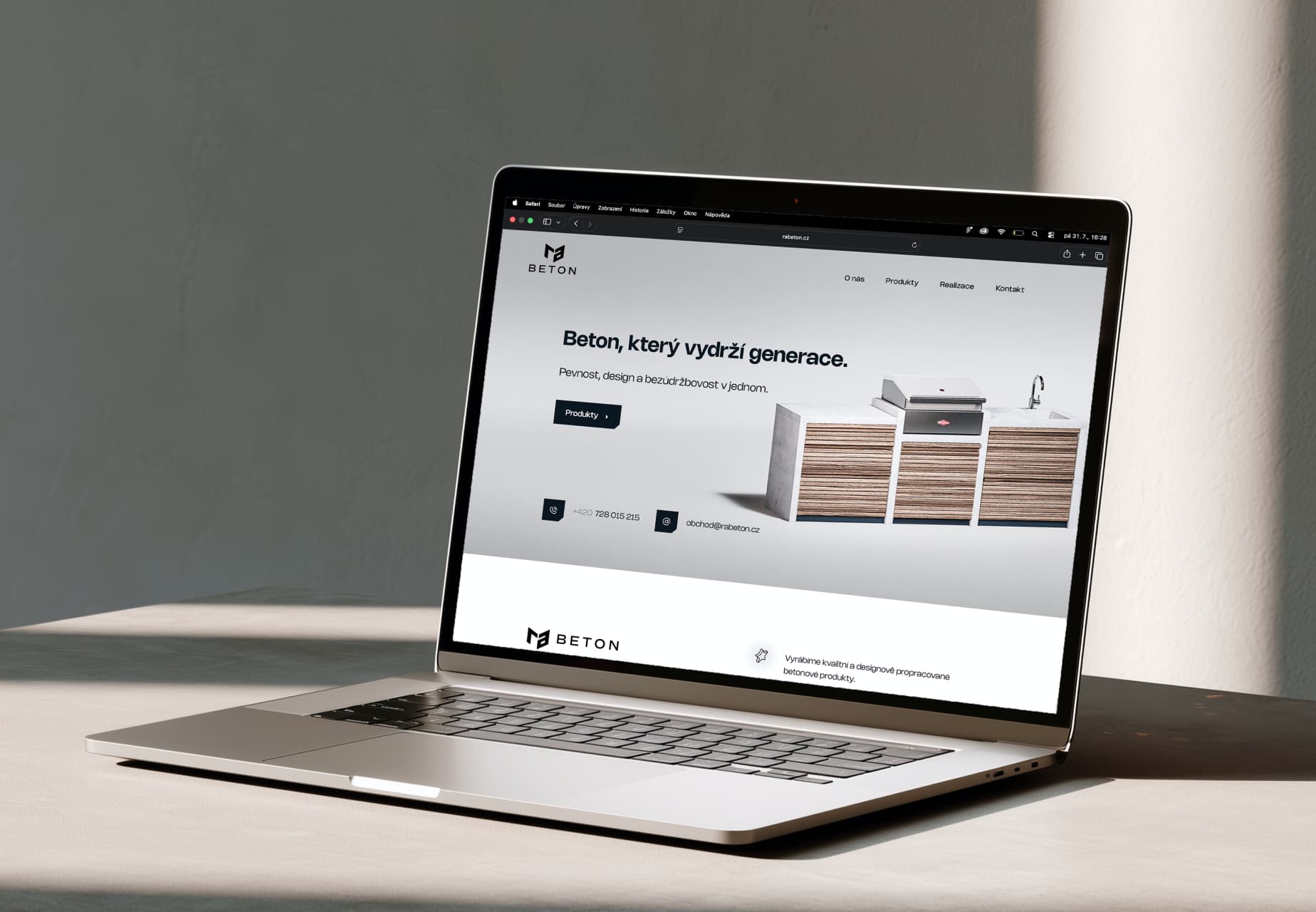 RA Beton website shown on a laptop
